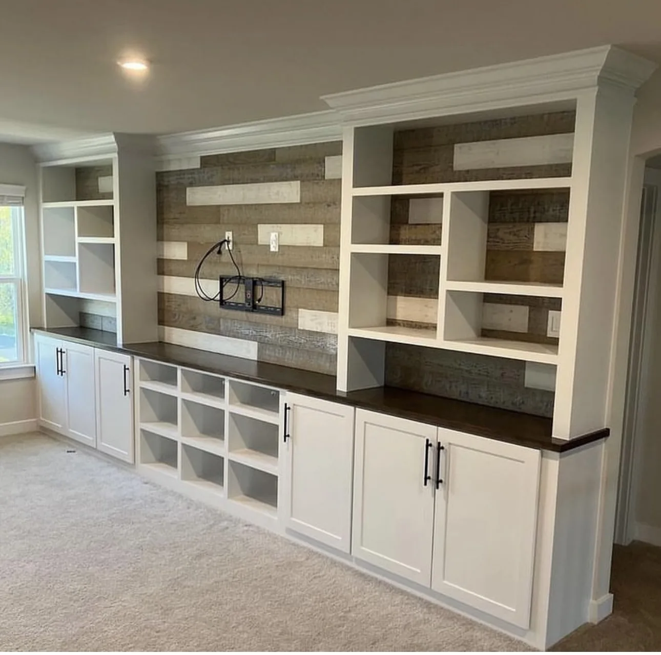 Cabinet installation service by Ribeiro Construction in modern home interior