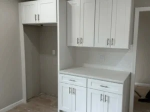 White shaker cabinets with additional storage installed for a modern, spacious kitchen.